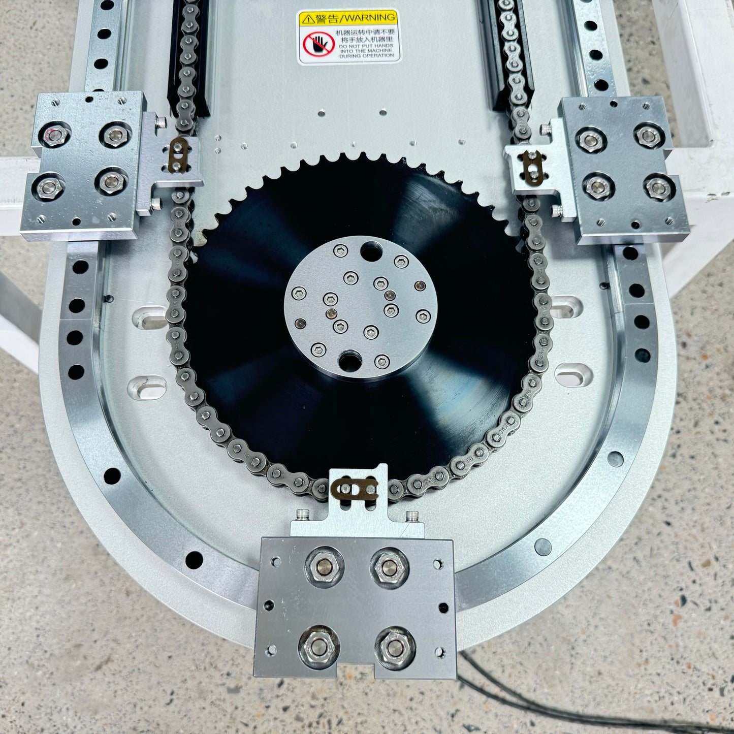 Drive chain and rail details of chain driven track system