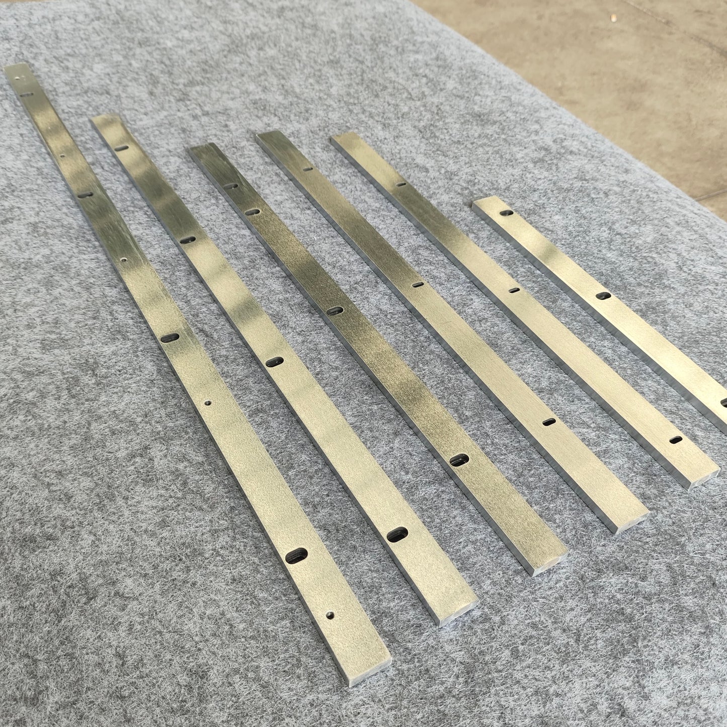 Chemical-resistant linear guides, circular guide conveyor lines, laboratory consumables assembly lines