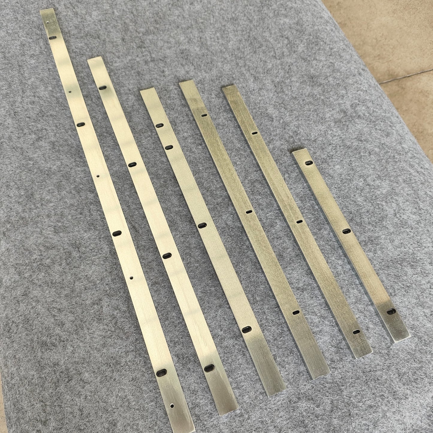 Chemical-resistant linear guides, circular guide conveyor lines, laboratory consumables assembly lines