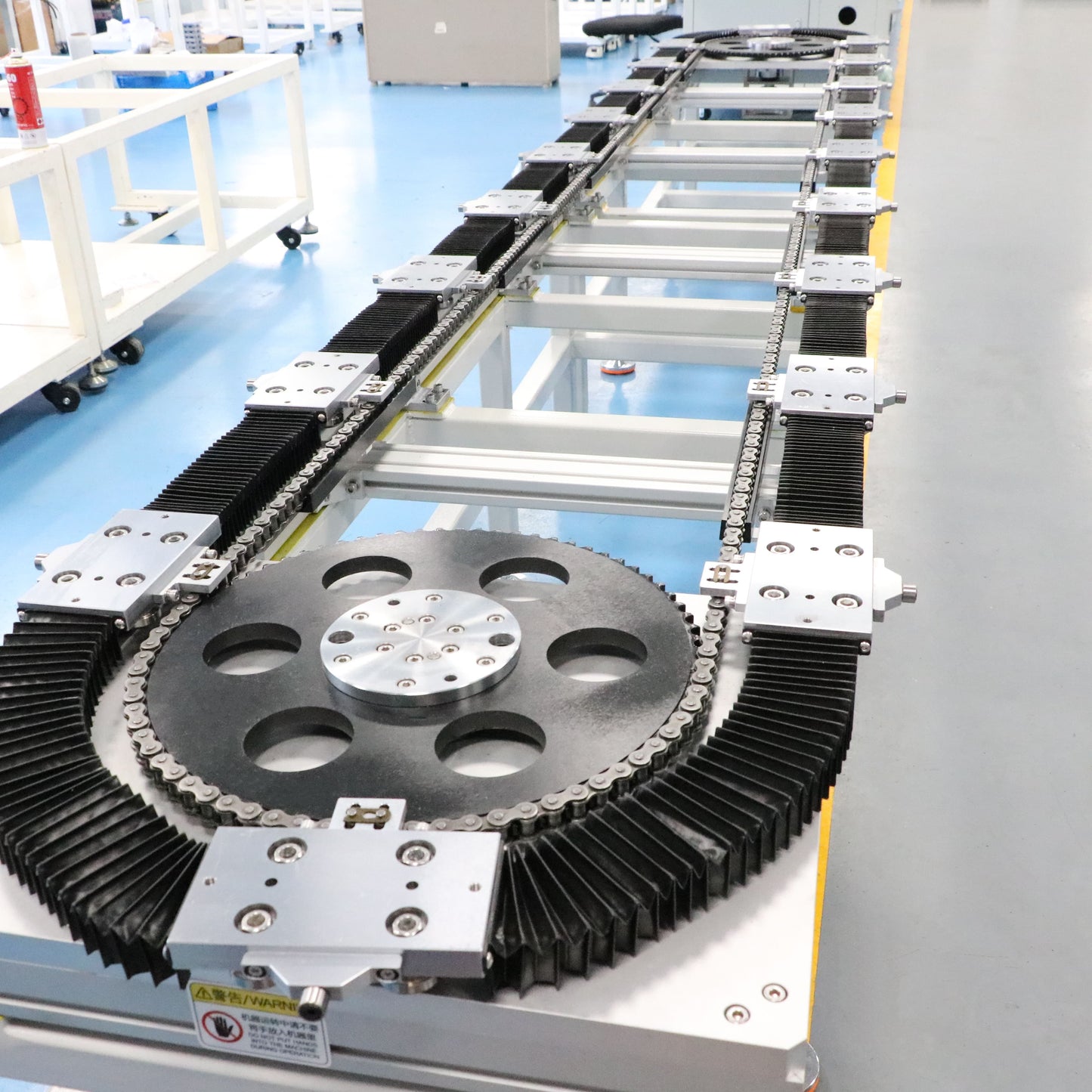 Dust-proof sealed steel Driven track system for medical supplies sterile assembly and cyclic production lines