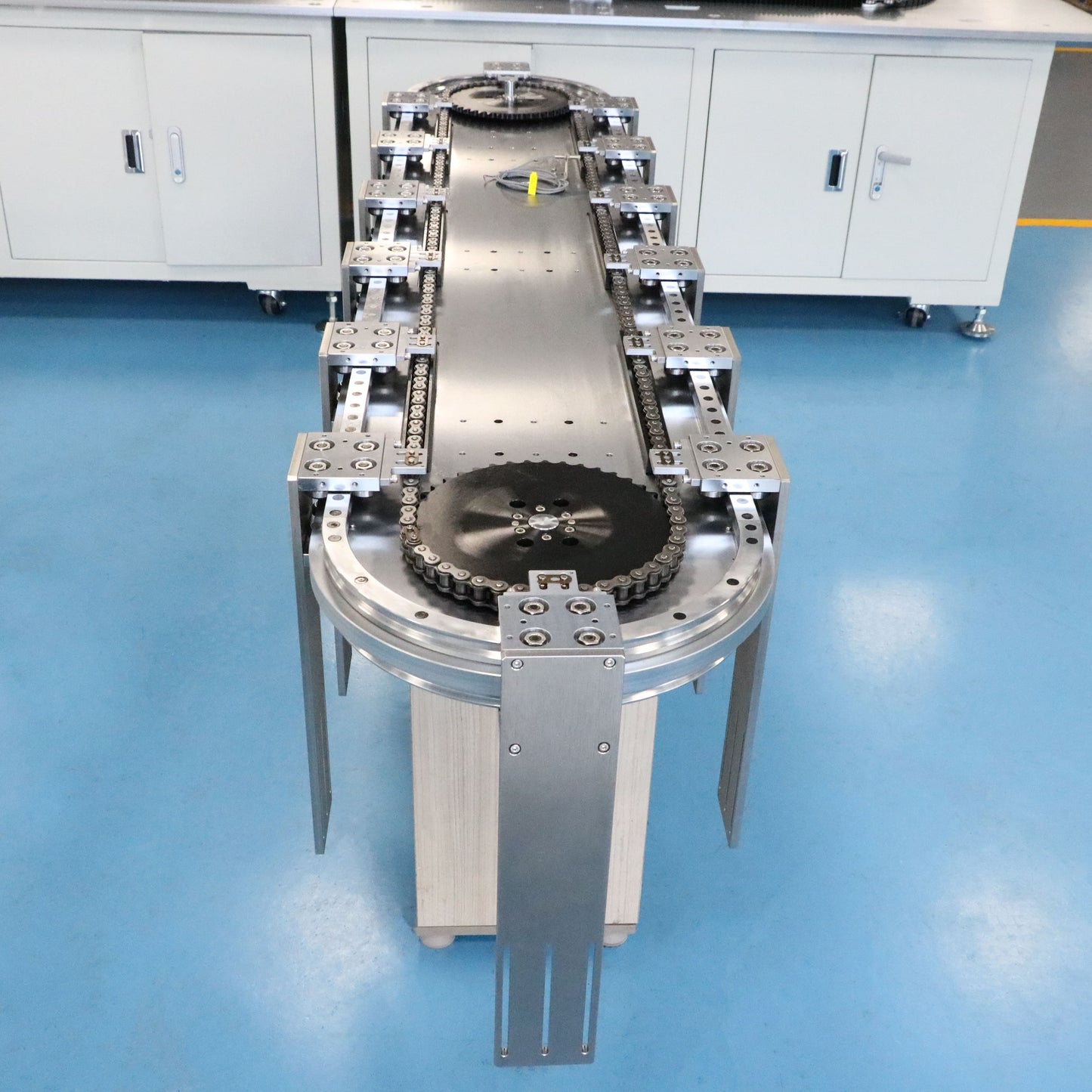 Shock-resistant alloy steel Driven track system for automotive harness routing and multi-angle conveying lines